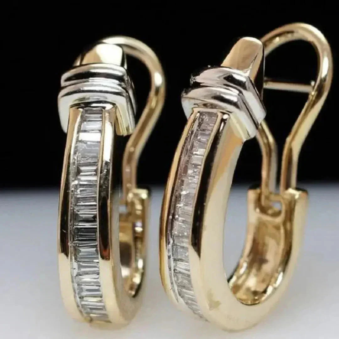 Vintageörhängen i guld och diamantstil