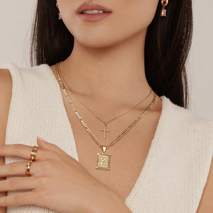 halsbandset med kors och initial | Guld