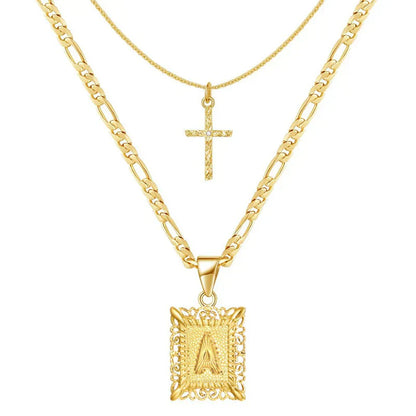 halsbandset med kors och initial | Guld