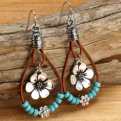 Boho-blomörhängen i silver med turkos