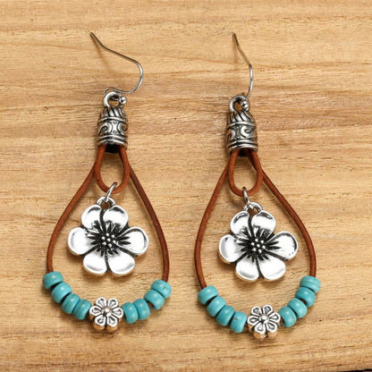 Boho-blomörhängen i silver med turkos