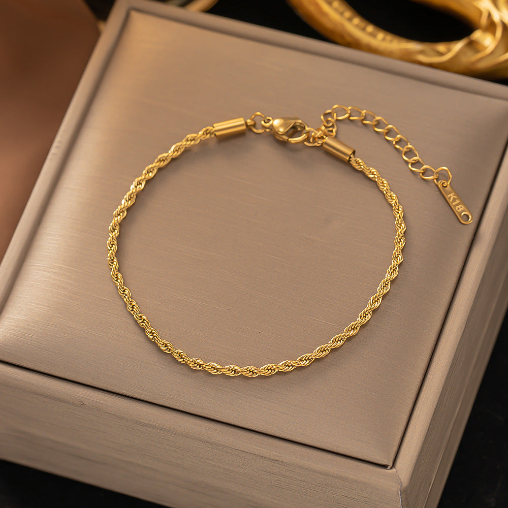 Tvinnad kedjearmband | Guld