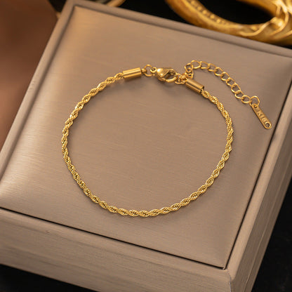 Tvinnad kedjearmband | Guld