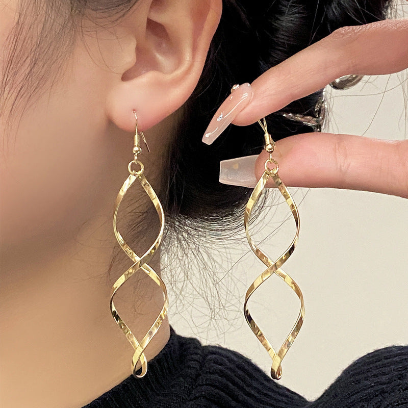 Spiral Dangle örhängen | Guld