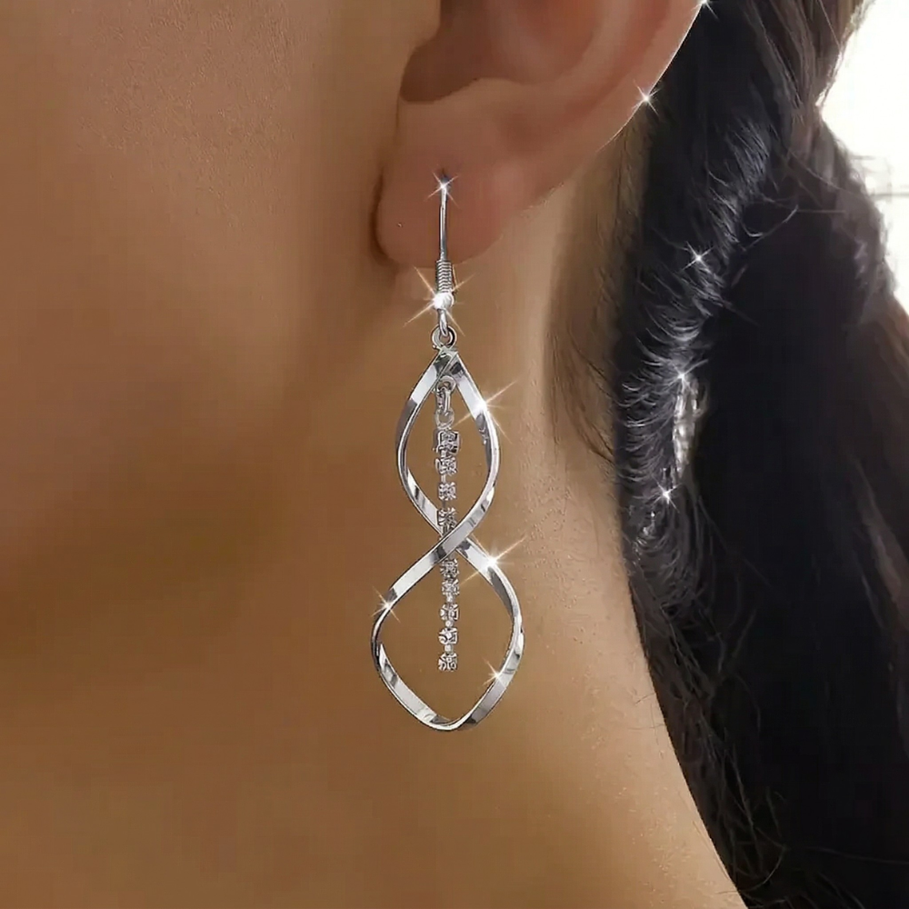 Sunbeam Spiral örhängen | Guld