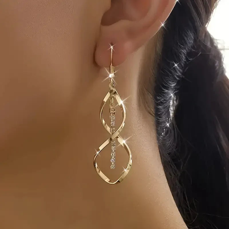Sunbeam Spiral örhängen | Guld
