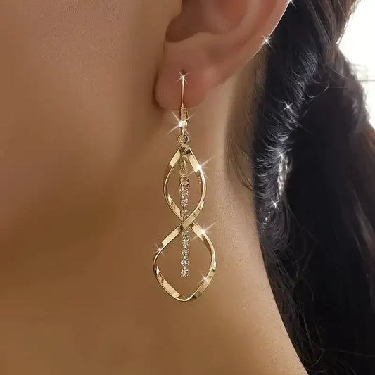 Sunbeam Spiral örhängen | Guld